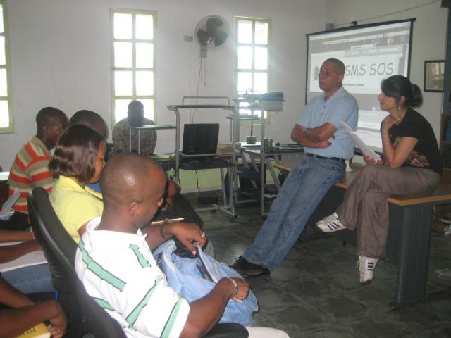Aashika Damodar of Survivors Connect at an outreach discussion for Ayiti SMS SOS.