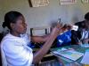 A HIV counselor in Kenya scans a patient’s demographic information into ODK Collect.